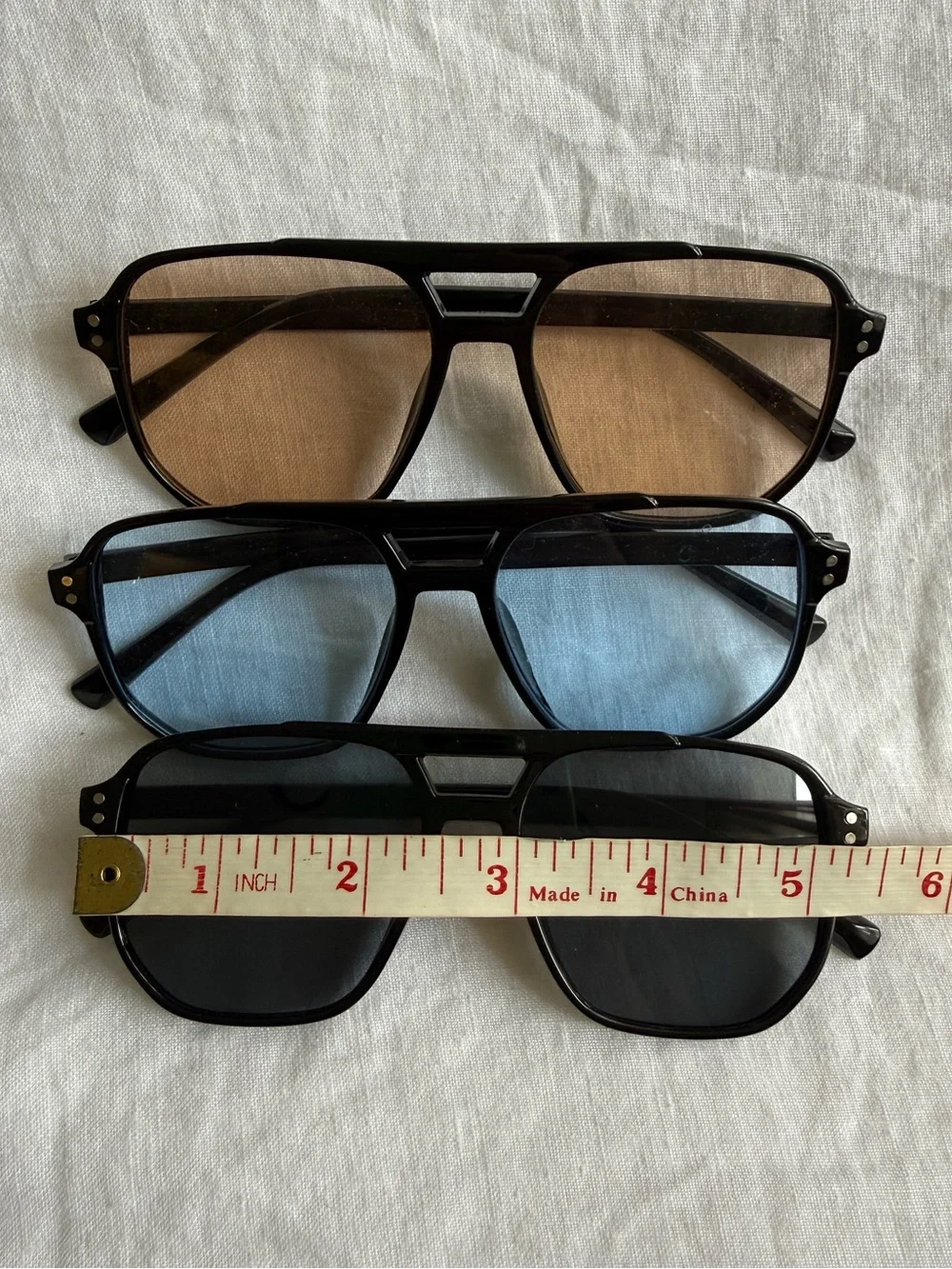 Aviator-Style Black Frame Sunglasses Trio with Brown, Blue, and Black Lenses